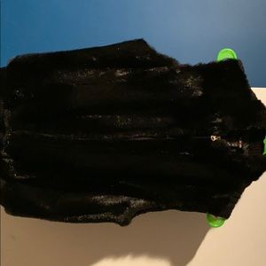 Black fuzzy vest sweater great for the holidays !